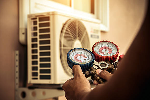 Professional Air Conditioning Service technician working in Doylestown, PA